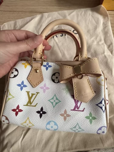 New M13391 M13406 M81085 High Quality 16x10x7.5cm Real leather Handbag BB-928070 photo review